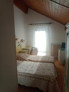 Postel nebo postele na pokoji v ubytování Oberthaler Hotel