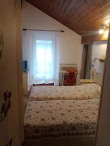 Postel nebo postele na pokoji v ubytování Oberthaler Hotel
