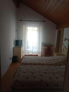 Postel nebo postele na pokoji v ubytování Oberthaler Hotel
