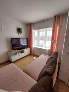 Telewizja i/lub zestaw kina domowego w obiekcie Casa DamiAnna - Pool - WiFi - FuerteventuraBay