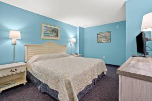 Tempat tidur dalam kamar di Avista Resort 1503