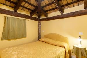Postel nebo postele na pokoji v ubytování Hotel Sant'Andrea