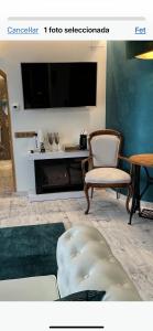 TV/Unterhaltungsangebot in der Unterkunft El Molí de Pontons suites con jacuzzi spa