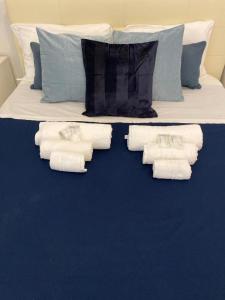 Letto o letti in una camera di DOMUS LUIGI LEONE 2
