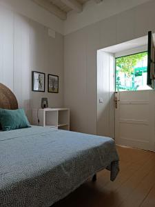 Ένα ή περισσότερα κρεβάτια σε δωμάτιο στο Las Setas Estudio II