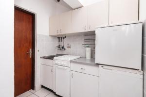 Kuchyňa alebo kuchynka v ubytovaní Apartments Stefani