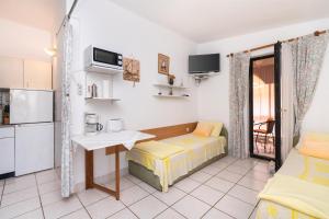 Kuchyňa alebo kuchynka v ubytovaní Apartments Stefani