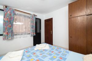 Posteľ alebo postele v izbe v ubytovaní Apartments Stefani