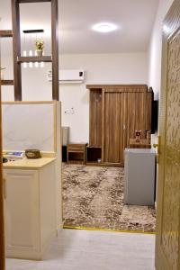 an empty room with a desk and a counter top at فندق نجران ول ان in Najran