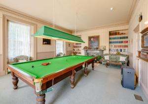 a living room with a pool table in it at Courtney - Upcott House in Barnstaple