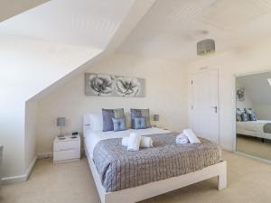 Postel nebo postele na pokoji v ubytování The Ferns