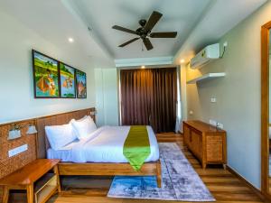 Mystique Mayong Resort客房内的一张或多张床位
