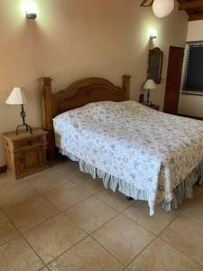 a bedroom with a large bed and two night stands at Coronado Beachfront tropical home! in Playa Coronado