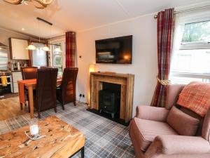 Φωτογραφία από το άλμπουμ του Loch Lomond Holiday Home σε Arrochar