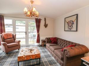 Φωτογραφία από το άλμπουμ του Loch Lomond Holiday Home σε Arrochar