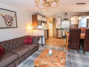 Φωτογραφία από το άλμπουμ του Loch Lomond Holiday Home σε Arrochar