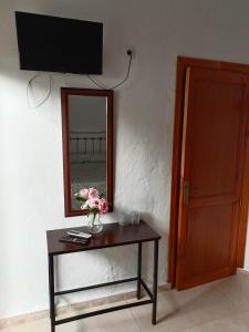 Televízia a/alebo spoločenská miestnosť v ubytovaní Casa Rural Patio Rociero + 37 fotografií