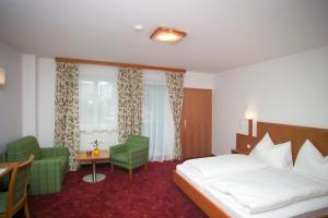 Letto o letti in una camera di Gasthof Oberer Gesslbauer