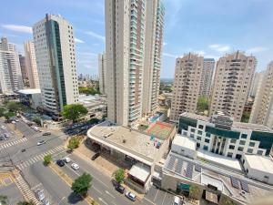 an aerial view of a city with tall buildings at Aconchegante apto 2/4 Setor Bueno 1307 in Goiânia