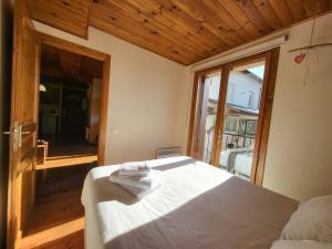 Postel nebo postele na pokoji v ubytování Acogedor Apartamento en Osséja