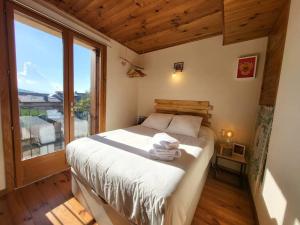 Postel nebo postele na pokoji v ubytování Acogedor Apartamento en Osséja