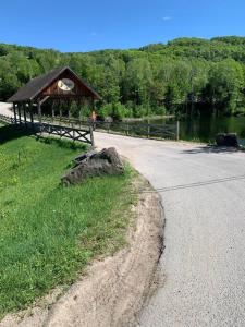 a gazebo sitting on the side of a road at Chalet ski-in/ski-out jacuzzi lac #CITQ:305992 in Saint-Faustin
