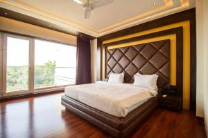 Voodi või voodid majutusasutuse F3 Macau Villa toas