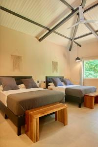 Postel nebo postele na pokoji v ubytování LaLola Villa Privada + 37 fotografií