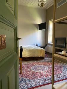 מיטה או מיטות בחדר ב-Nives
