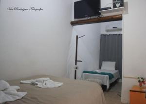 Postel nebo postele na pokoji v ubytování Pousada Maravilha de Ará