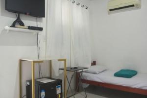Postel nebo postele na pokoji v ubytování Pousada Maravilha de Ará