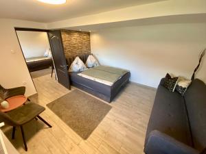 Łóżko lub łóżka w pokoju w obiekcie Mountain Lodge