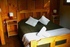 Un ou plusieurs lits dans un hébergement de l'établissement Antucalhue Mountain Resort