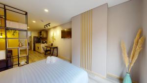 Letto o letti in una camera di The Cabrera Eighty Fifth Hotel