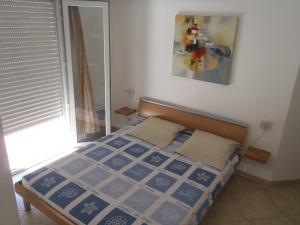 Postel nebo postele na pokoji v ubytování Appartement Les Alizés
