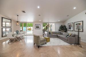 a living room with a couch and a table at Private Executive Home, Pet Friendly, Walkable in Scottsdale