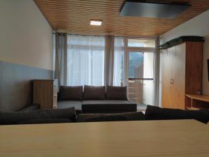 Setusvæði á Cosy Apartment