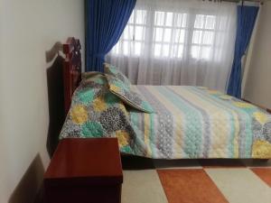 Postel nebo postele na pokoji v ubytování Hospedaje Rodal