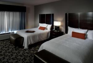 A bed or beds in a room at Hampton Inn and Suites Marksville