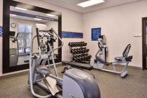 a gym with two treadmills and cardio machines at Hampton Inn Gonzales in Gonzales