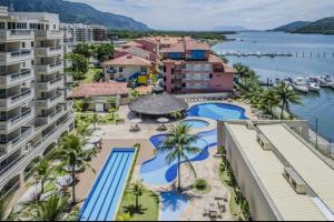 an aerial view of a resort with a swimming pool at Loft 326 - APTO E VISTA ESPETACULARES in Mangaratiba