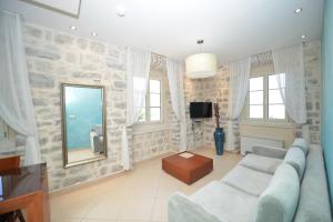 TV i/ili multimedijalni sistem u objektu Vila Nikčević Apartments +37 fotografija