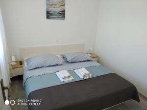 Posteľ alebo postele v izbe v ubytovaní Apartments by the sea Kuciste - Perna, Peljesac - 4544