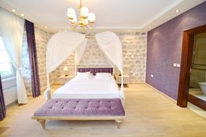 Postel nebo postele na pokoji v ubytování Vila Nikčević Apartments