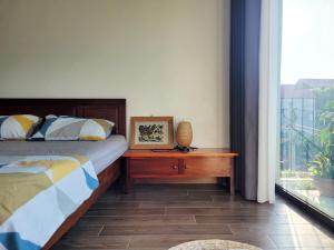 Postel nebo postele na pokoji v ubytování Noi Bai Flight Path Homestay