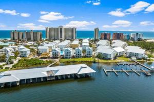 an aerial view of a resort on the water at Osprey -Luxury 3BDR Beach House in Orange Beach