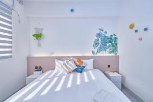 Voodi või voodid majutusasutuse HiHi Skylight toas