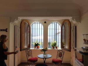 Uma área de estar em Hostal Boutique Casa La Barca