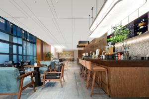 A restaurant or other place to eat at UrCove by Hyatt Hangzhou Xiaoshan International Airport