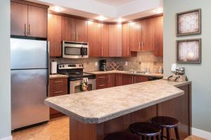 A kitchen or kitchenette at Sun & Sails Villa by the Beach